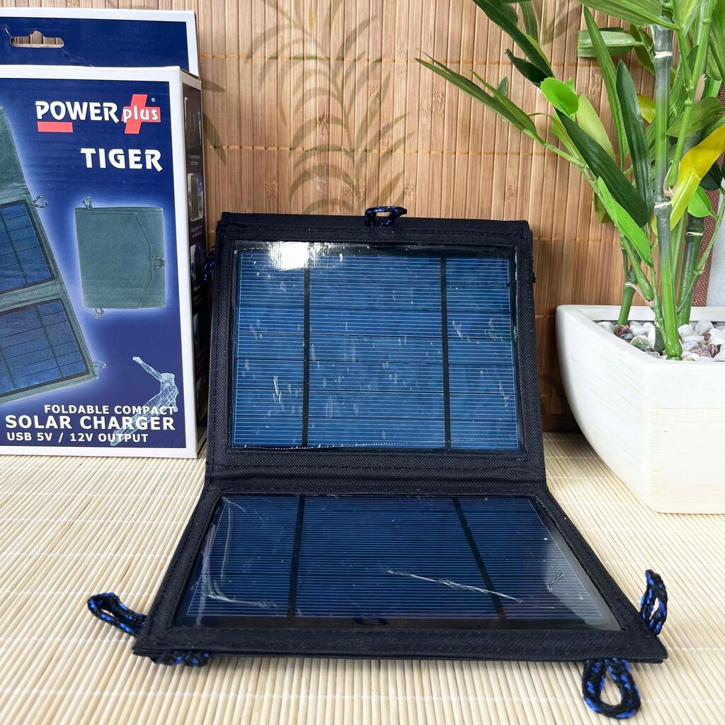 Foldable Solar Charger POWERplus Tiger Solar Panel (Image 1 of 4) - Independent solar energy for your 5V AND 12V USB devices – wherever you are! The POWERplus® Tig. Keywords: toy. SKU: PP-Tiger